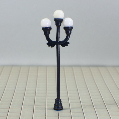 China N tren diseño iluminación calle modelo poste de luz escala 7 cm proveedor